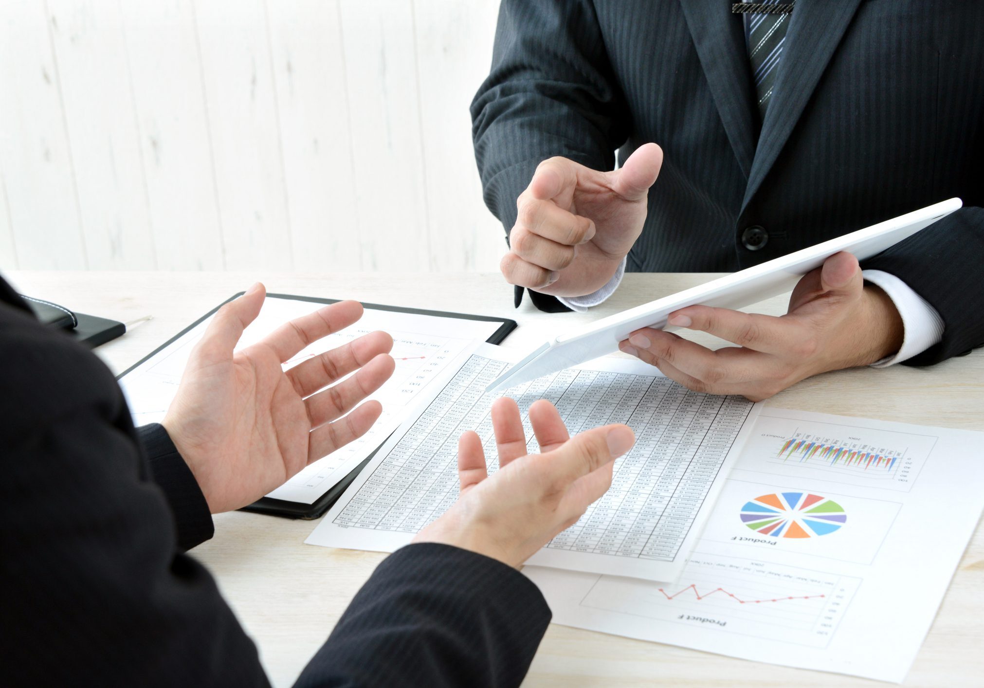 Business concepts, metting with tablet Blessed Team Consulting LLC